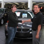 Car Salesman Shake Hands