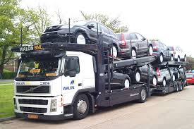 auto transport truck loaded with cars