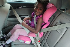 girl in car seat extra safety