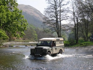 Land Rover crossing a river